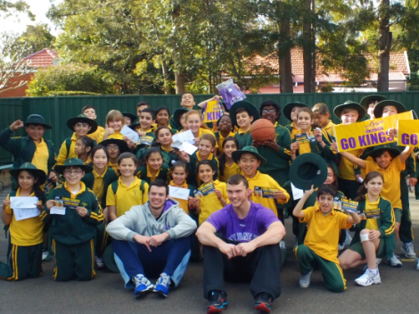 Sydney Kings players Angus Brandt and Jason Cadee with Year 5 students