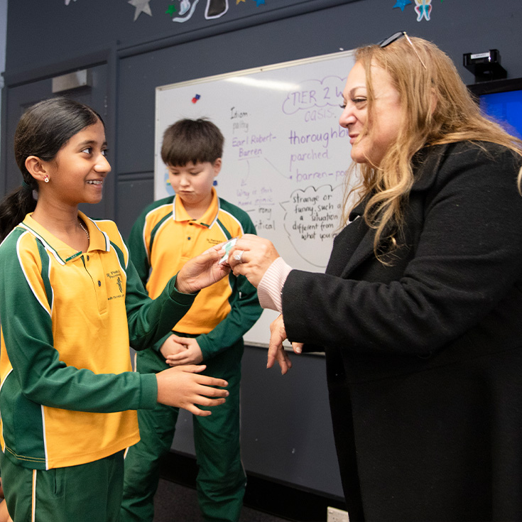 St Patrick's Catholic Primary School Parramatta students learning with dedicated teacher